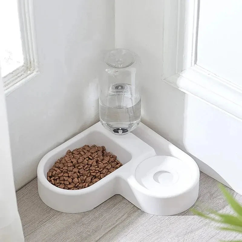 Gamelle multifonctionnelle pour animaux (chat et chien) : abreuvoir et mangeoire automatiques, résistante à l'humidité.