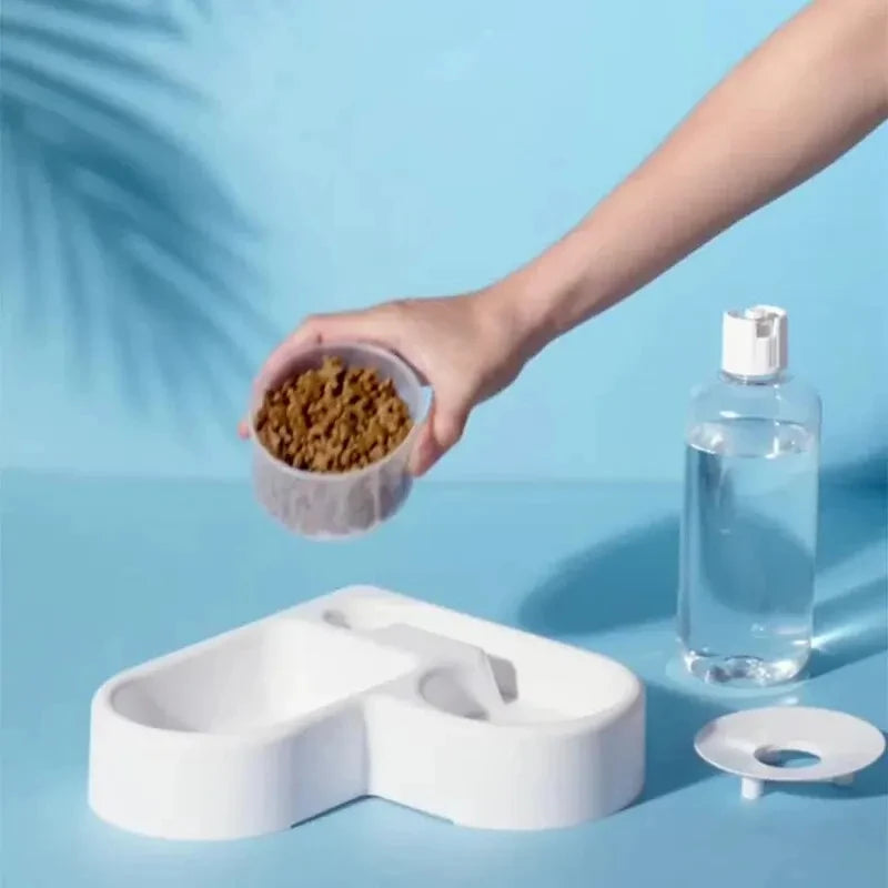Gamelle multifonctionnelle pour animaux (chat et chien) : abreuvoir et mangeoire automatiques, résistante à l'humidité.